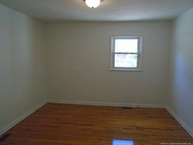 2631 Stonehaven Dr, Fayetteville, NC 28306 - spare room featuring wood finished floors