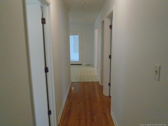 2631 Stonehaven Dr, Fayetteville, NC 28306 - hallway with wood finished floors and baseboards