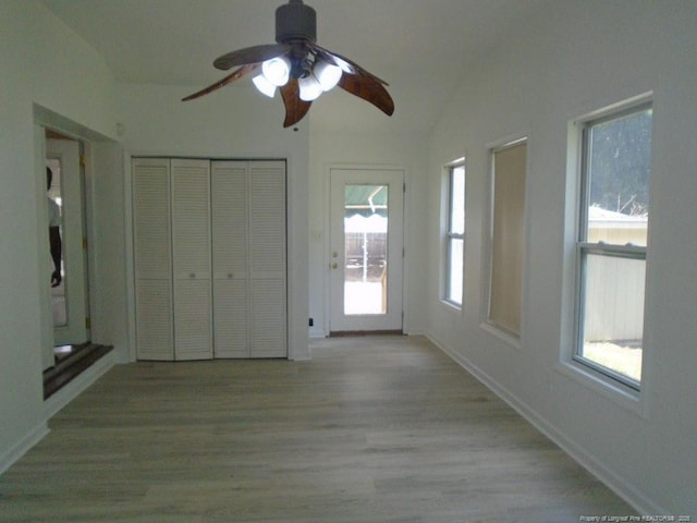 2631 Stonehaven Dr, Fayetteville, NC 28306 - unfurnished bedroom with light wood-style flooring, a closet, ceiling fan, and vaulted ceiling