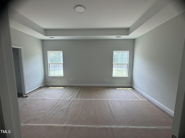 5486 Jaeger Dr Lot # 37, Graham, NC 27253 - unfurnished room with carpet and a tray ceiling