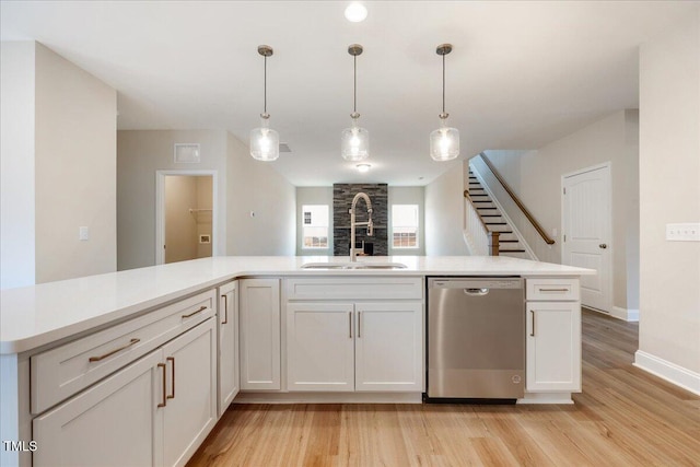 5486 Jaeger Dr Lot # 37, Graham, NC 27253 - kitchen with dishwasher, light countertops, and light wood finished floors
