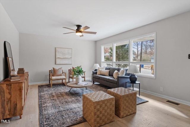 3408 Brentwood Rd, Raleigh, NC 27604 - living area with wood finished floors and a ceiling fan