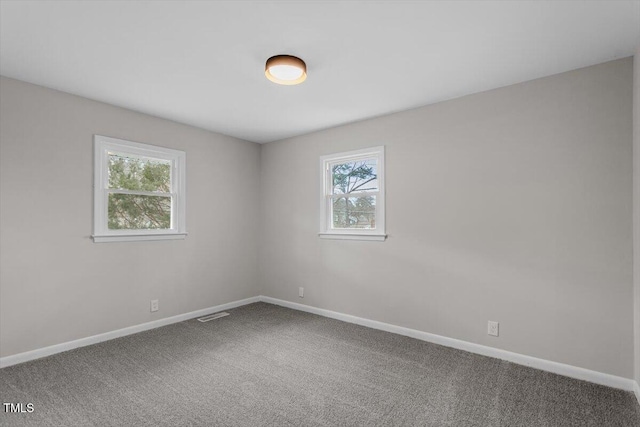 3408 Brentwood Rd, Raleigh, NC 27604 - unfurnished room with healthy amount of natural light and carpet flooring