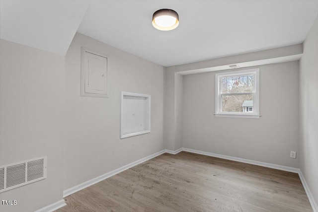 3408 Brentwood Rd, Raleigh, NC 27604 - spare room featuring wood finished floors and baseboards