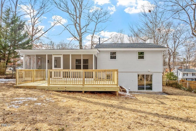 3408 Brentwood Rd, Raleigh, NC 27604 - back of property with a sunroom, a chimney, brick siding, and a wooden deck