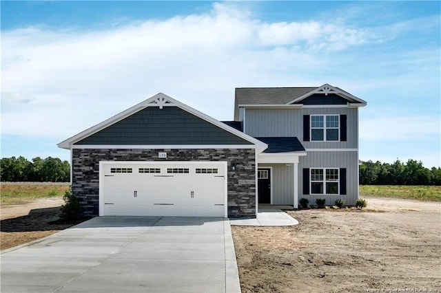 2677 NC Highway 20 W, Saint Pauls, NC 28384 - view of front of home with driveway and a garage