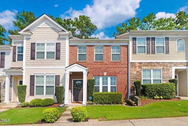 100 Stratford Lakes Dr # 322, Durham, NC 27713 - multi unit property featuring a front lawn and stone siding