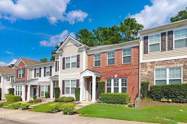100 Stratford Lakes Dr # 322, Durham, NC 27713 - townhome / multi-family property featuring stone siding