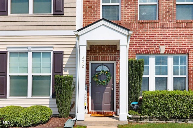 100 Stratford Lakes Dr # 322, Durham, NC 27713 - view of exterior entry featuring brick siding