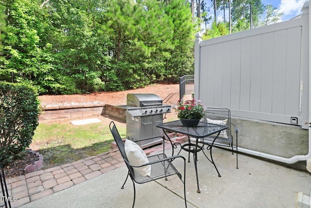 100 Stratford Lakes Dr # 322, Durham, NC 27713 - view of patio with a grill