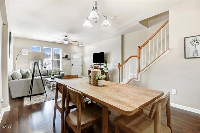 100 Stratford Lakes Dr # 322, Durham, NC 27713 - dining room featuring stairs, ceiling fan, dark wood finished floors, and a chandelier