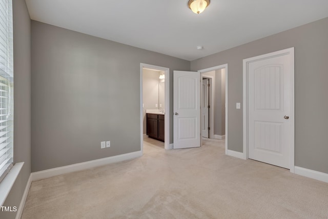 615 Fairway Dr, Mebane, NC 27302 - unfurnished bedroom with light colored carpet and connected bathroom
