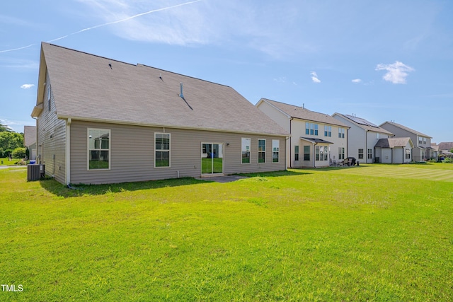 615 Fairway Dr, Mebane, NC 27302 - rear view of house featuring a yard, a residential view, and roof with shingles
