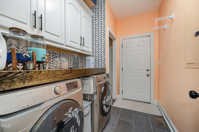 305 Maddux Dr, Pikeville, NC 27863 - washroom with cabinet space, washing machine and dryer, dark tile patterned floors, and electric panel