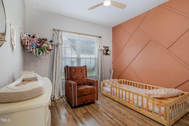 305 Maddux Dr, Pikeville, NC 27863 - bedroom with wood finished floors and ceiling fan
