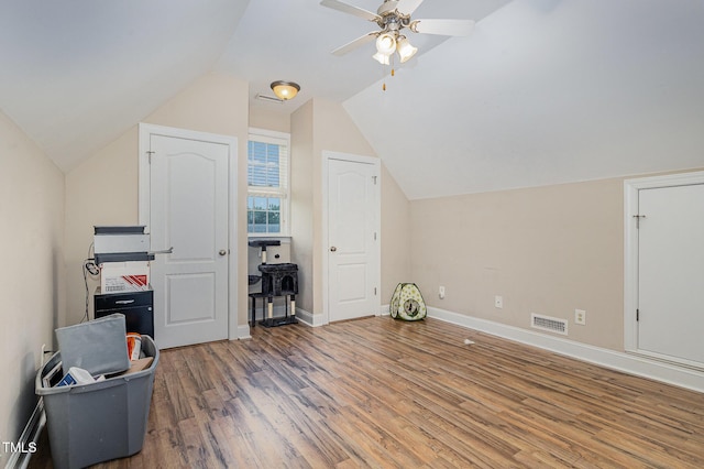 305 Maddux Dr, Pikeville, NC 27863 - additional living space with wood finished floors, a ceiling fan, and lofted ceiling