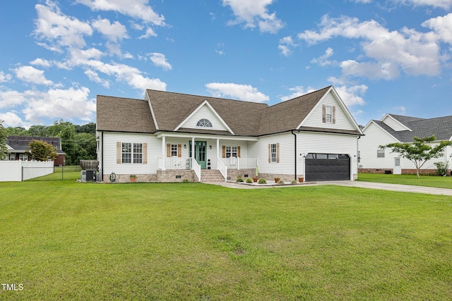 305 Maddux Dr, Pikeville, NC 27863 - view of front of home featuring covered porch, driveway, crawl space, a garage, and a shingled roof