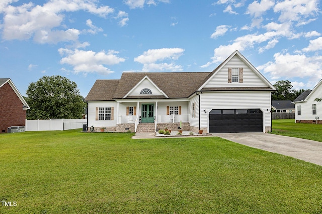 305 Maddux Dr, Pikeville, NC 27863 - traditional-style house featuring driveway, a garage, covered porch, and a shingled roof