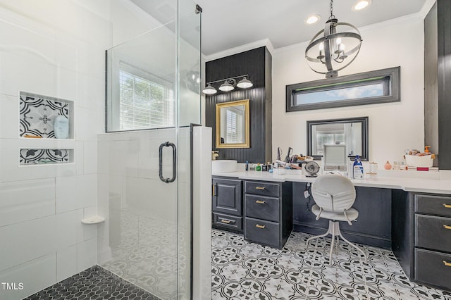 305 Maddux Dr, Pikeville, NC 27863 - bathroom featuring a stall shower, healthy amount of natural light, crown molding, vanity, and tile patterned floors