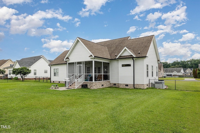 305 Maddux Dr, Pikeville, NC 27863 - back of property with crawl space, a sunroom, roof with shingles, a fenced backyard, and a patio area
