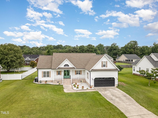 305 Maddux Dr, Pikeville, NC 27863 - view of front of property featuring a porch, concrete driveway, and roof with shingles