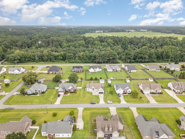 305 Maddux Dr, Pikeville, NC 27863 - aerial perspective of suburban area featuring a forest