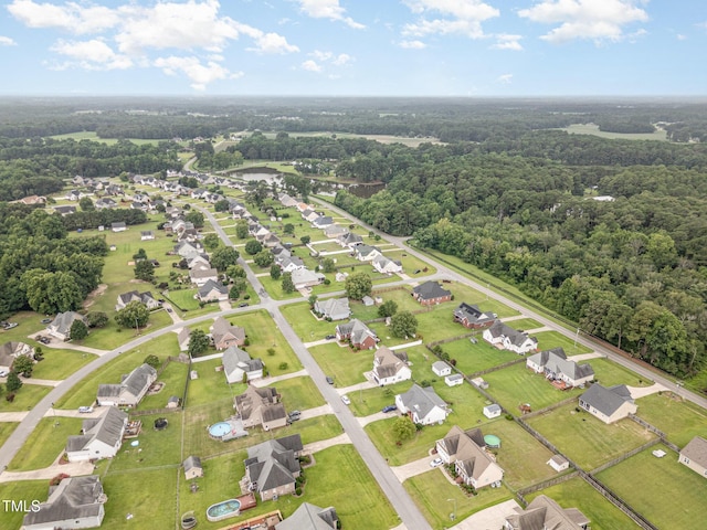305 Maddux Dr, Pikeville, NC 27863 - aerial perspective of suburban area with a forest