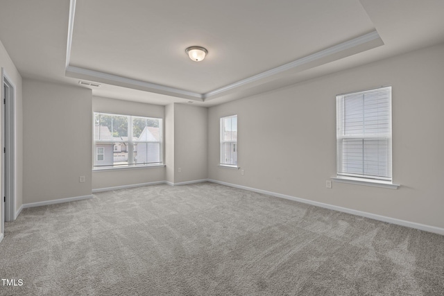 348 Abbots Mill Dr, Raleigh, NC 27603 - carpeted empty room with a tray ceiling and crown molding