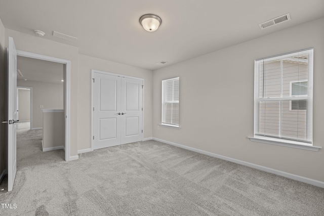 348 Abbots Mill Dr, Raleigh, NC 27603 - unfurnished bedroom with carpet floors and a closet