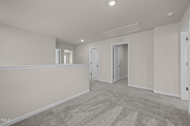 348 Abbots Mill Dr, Raleigh, NC 27603 - carpeted spare room with attic access, a smoke detector, and recessed lighting