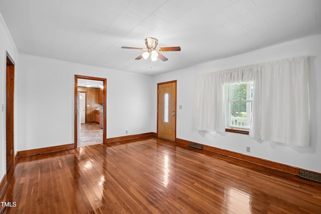 7060 Dirgie Mine Rd, Roxboro, NC 27574 - unfurnished living room featuring hardwood / wood-style floors and ceiling fan