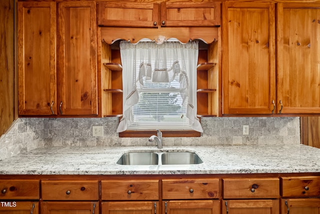 7060 Dirgie Mine Rd, Roxboro, NC 27574 - kitchen with open shelves, tasteful backsplash, and brown cabinetry