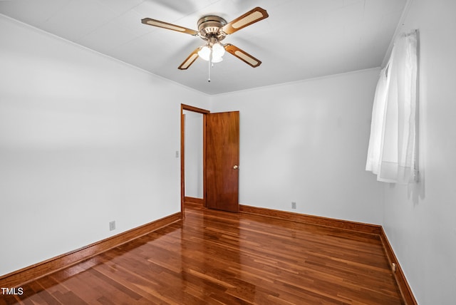 7060 Dirgie Mine Rd, Roxboro, NC 27574 - spare room featuring wood finished floors, a ceiling fan, and ornamental molding