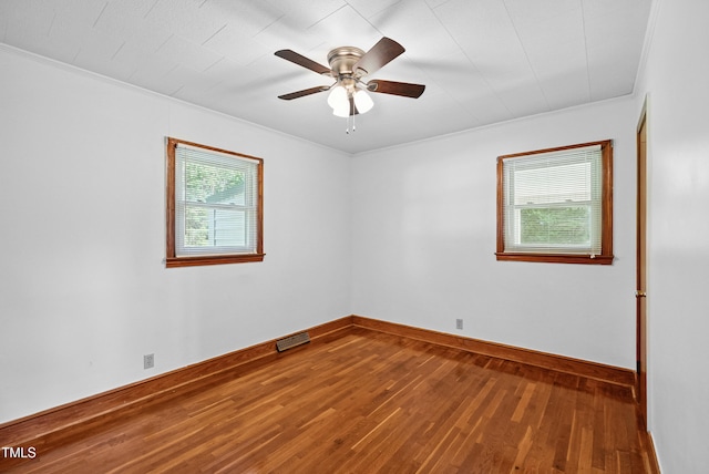 7060 Dirgie Mine Rd, Roxboro, NC 27574 - unfurnished room featuring wood-type flooring, ornamental molding, and ceiling fan