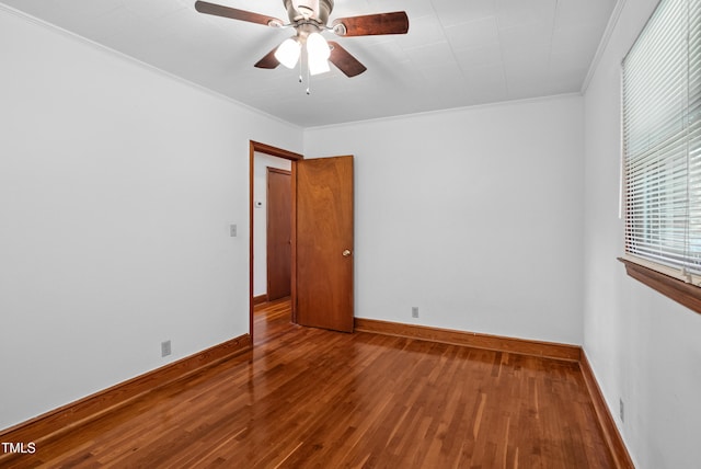 7060 Dirgie Mine Rd, Roxboro, NC 27574 - spare room with wood-type flooring, ornamental molding, and a ceiling fan