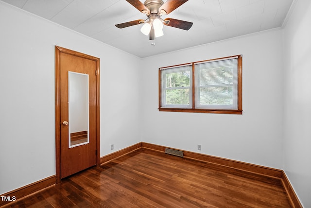 7060 Dirgie Mine Rd, Roxboro, NC 27574 - spare room with crown molding, dark wood finished floors, and ceiling fan