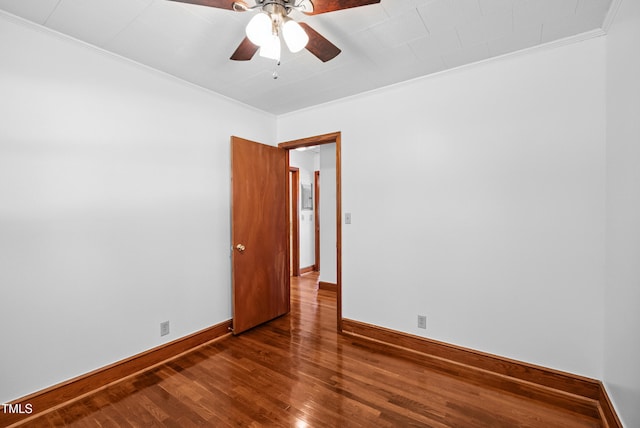 7060 Dirgie Mine Rd, Roxboro, NC 27574 - empty room featuring ornamental molding, dark wood finished floors, and ceiling fan