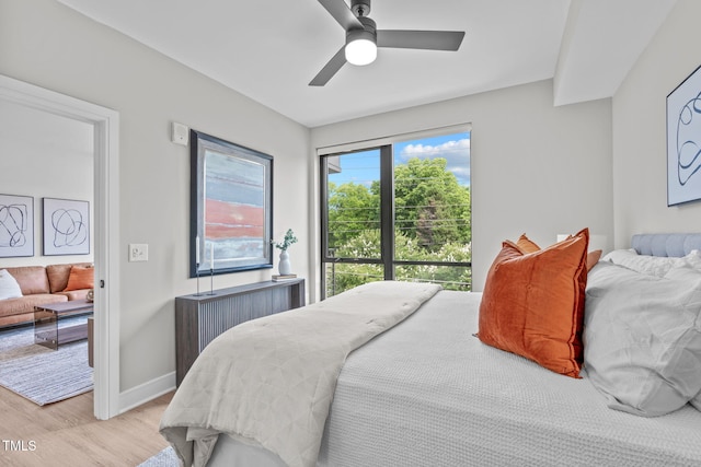 615 W Peace St Unit 302, Raleigh, NC 27605 - bedroom with light wood-style floors and ceiling fan