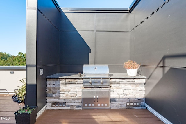 615 W Peace St Unit 302, Raleigh, NC 27605 - view of patio featuring exterior kitchen and a wooden deck