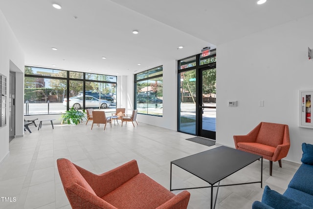 615 W Peace St Unit 302, Raleigh, NC 27605 - lobby with a wall of windows and recessed lighting