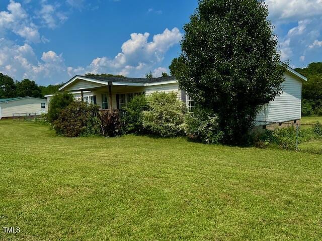 174 Daffodil Dr, Henderson, NC 27537 - view of green lawn
