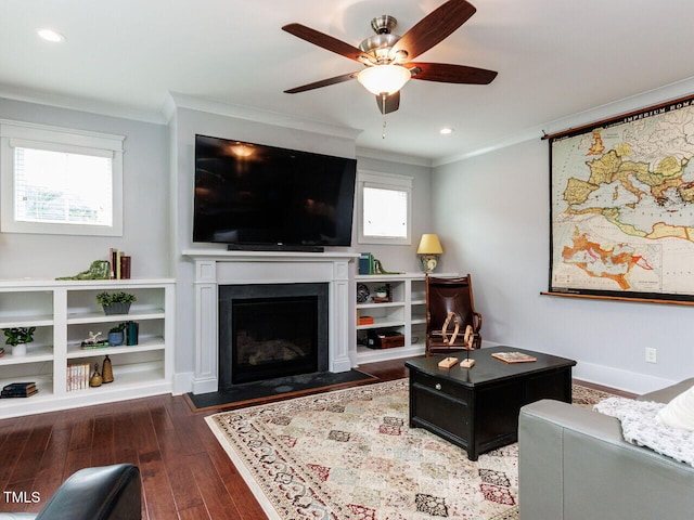 8712 Halsey Ln, Wake Forest, NC 27587 - living room with ornamental molding, wood finished floors, a fireplace with flush hearth, ceiling fan, and recessed lighting