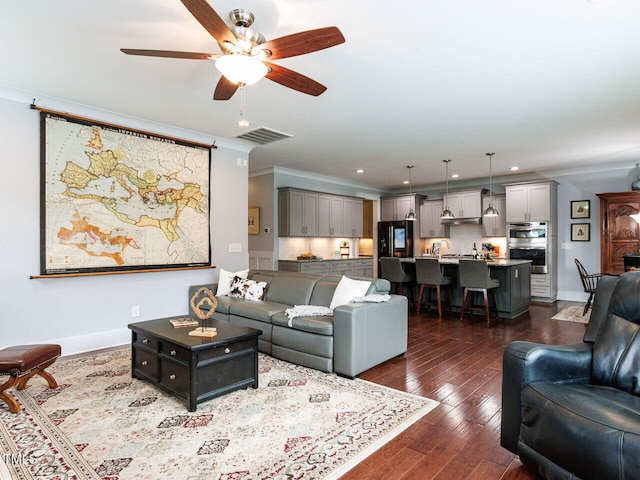8712 Halsey Ln, Wake Forest, NC 27587 - living room featuring ornamental molding, a ceiling fan, dark wood-style flooring, and recessed lighting