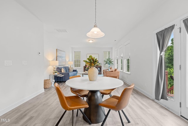 837 Stable Fern Dr, Fuquay Varina, NC 27526 - dining area with light wood-style floors