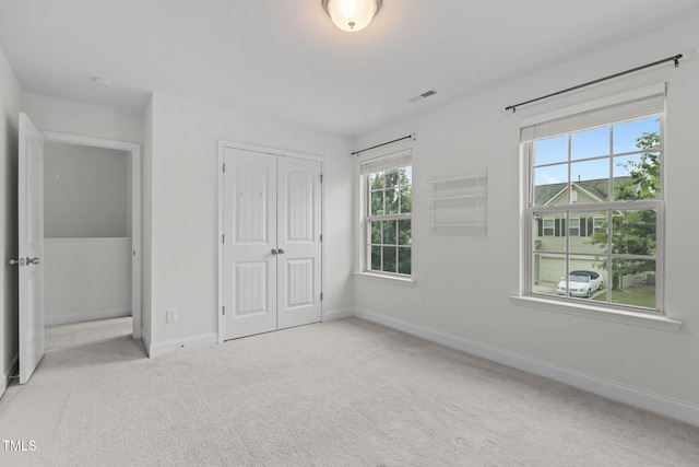 837 Stable Fern Dr, Fuquay Varina, NC 27526 - unfurnished bedroom with carpet floors and a closet