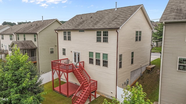837 Stable Fern Dr, Fuquay Varina, NC 27526 - back of property with a shingled roof, a deck, and stairs