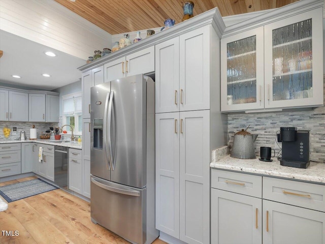 358 Benjie Williams Rd, Staley, NC 27355 - kitchen featuring stainless steel appliances, tasteful backsplash, wooden ceiling, recessed lighting, and glass insert cabinets