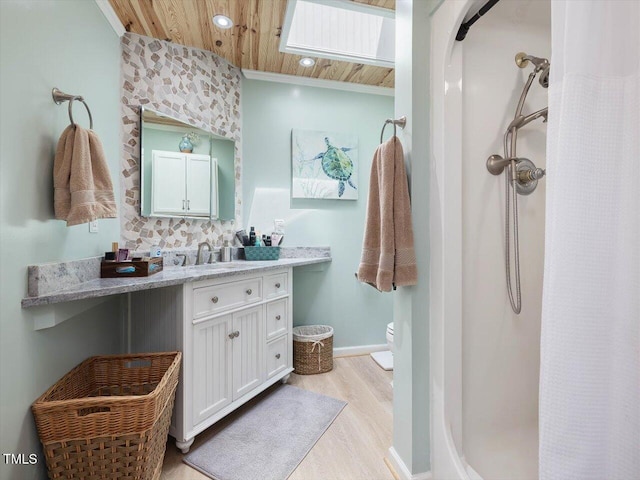 358 Benjie Williams Rd, Staley, NC 27355 - full bath featuring a shower with shower curtain, wood finished floors, vanity, wood ceiling, and recessed lighting