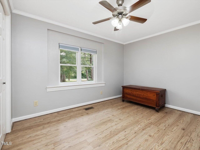 358 Benjie Williams Rd, Staley, NC 27355 - spare room featuring wood finished floors, ornamental molding, and ceiling fan