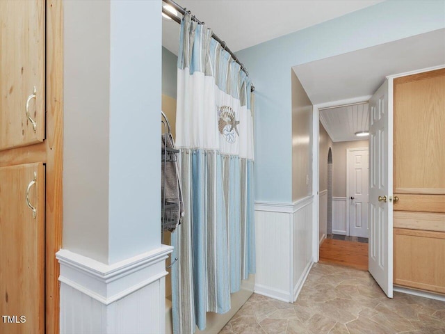 358 Benjie Williams Rd, Staley, NC 27355 - bathroom featuring wainscoting and a shower with curtain